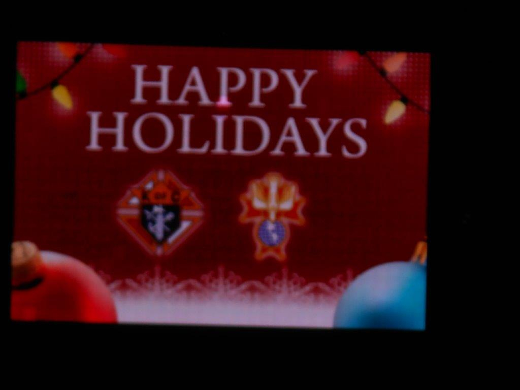 A red and white card with the words happy holidays